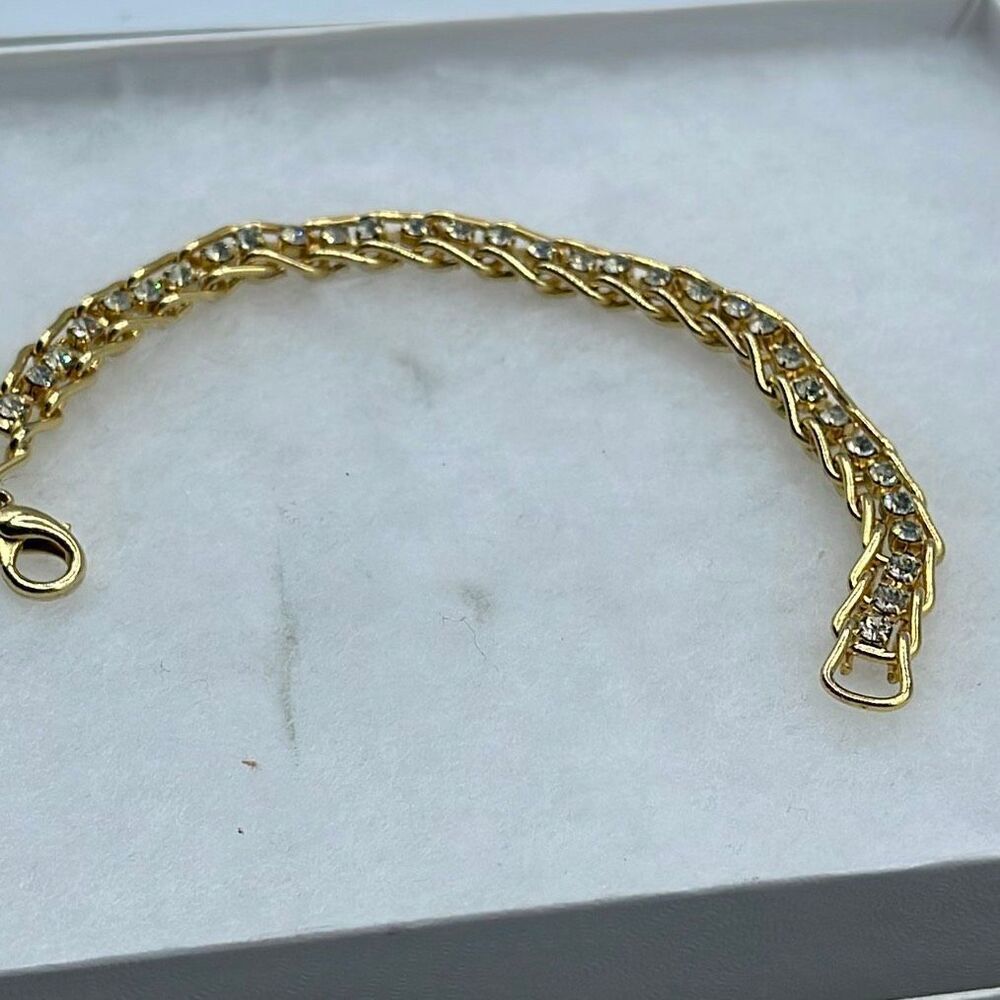 Vintage rhinestone tennis bracelet 7” gold-tone.